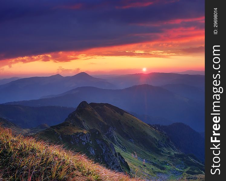 Landscape with a beautiful sunrise in the mountains