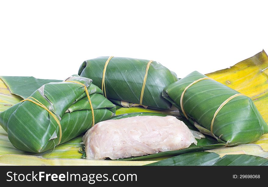 Sour pork in banana leaf isolated on white background