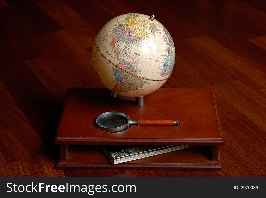 A small table globe standing on a prop have a beautiful luxury lightning