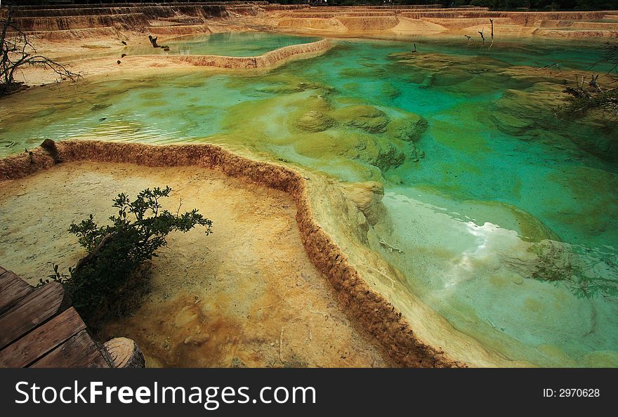 Situated in the north-west of Sichaun Province, the Huanglong valley is made up of snow-capped peaks and the easternmost of all the Chinese glaciers. In addition to its mountain landscape, diverse forest ecosystems can be found, as well as spectacular limestone formations, waterfalls and hot springs. The area also has a population of endangered animals, including the giant panda and the Sichuan golden snub-nosed monkey.   Huanglong was desinated as World Heritage Site by UNESCO in 1992. Situated in the north-west of Sichaun Province, the Huanglong valley is made up of snow-capped peaks and the easternmost of all the Chinese glaciers. In addition to its mountain landscape, diverse forest ecosystems can be found, as well as spectacular limestone formations, waterfalls and hot springs. The area also has a population of endangered animals, including the giant panda and the Sichuan golden snub-nosed monkey.   Huanglong was desinated as World Heritage Site by UNESCO in 1992