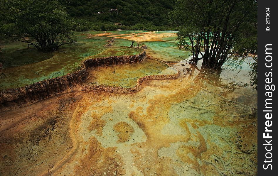 Limestone formations and hot springs in the Huanglong Valley, China. Limestone formations and hot springs in the Huanglong Valley, China.