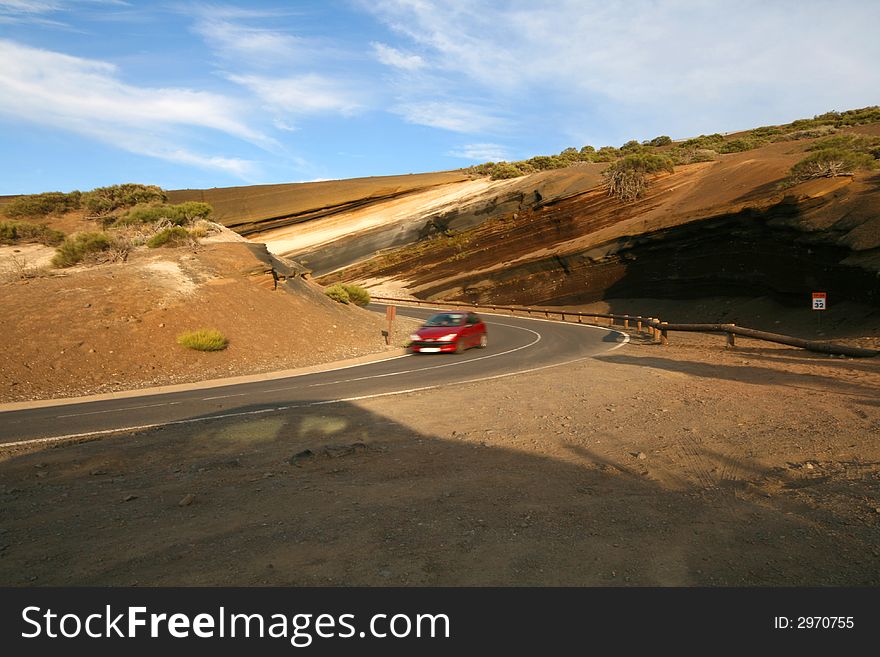 Red car in a curve. Red car in a curve