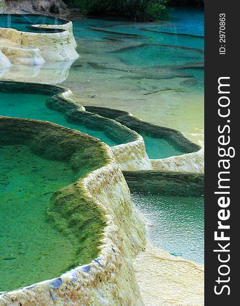 Limestone deposits and hot springs in the Huanglong Scenic Area, China.