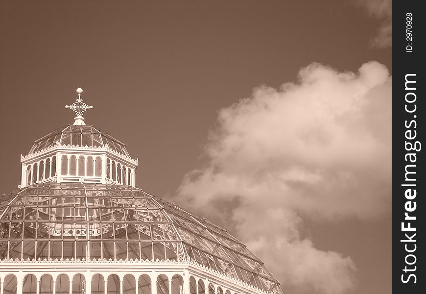 Top of the victorian Palm House in Sefton Park, Liverpool with sunlight reflected off the metalwork. Top of the victorian Palm House in Sefton Park, Liverpool with sunlight reflected off the metalwork.
