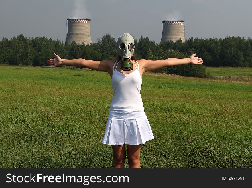 Girl in a gas mask and smoke pipes