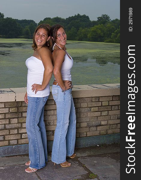 Two sisters posing for a portrait