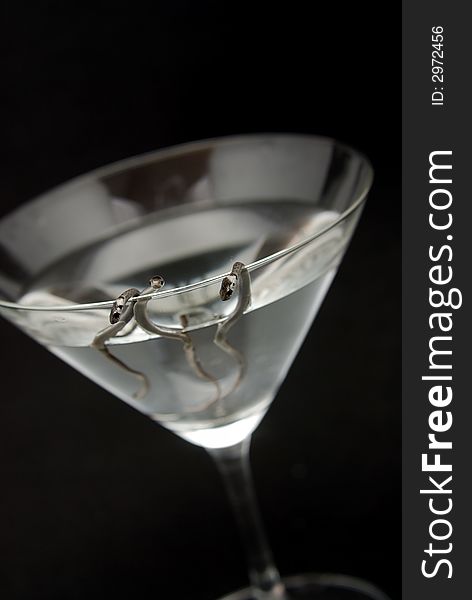 Three Snakes In Cocktail Glass