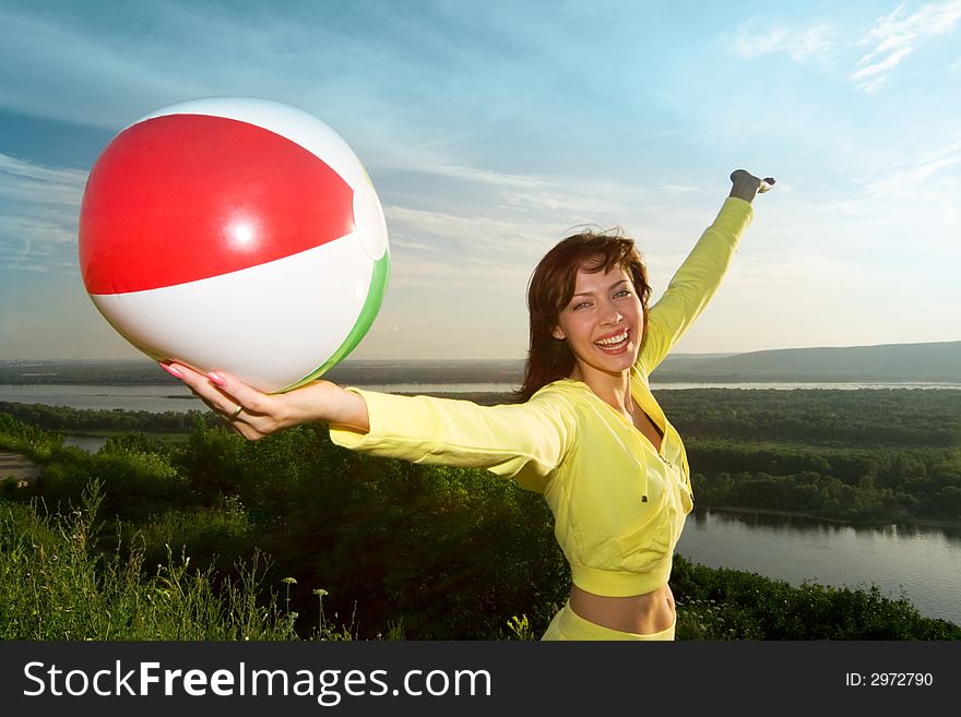 Happy young beautiful girl with air ball. Happy young beautiful girl with air ball