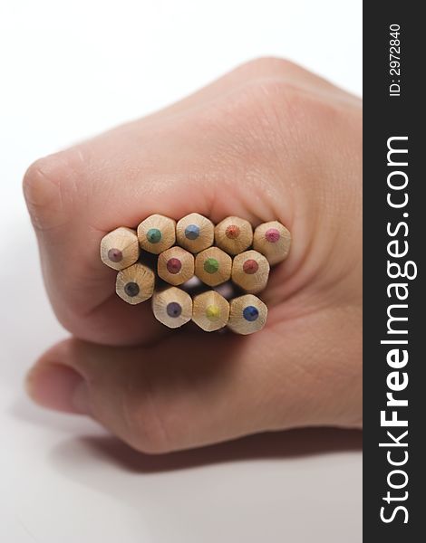 Hand Holding Wooden Pencils