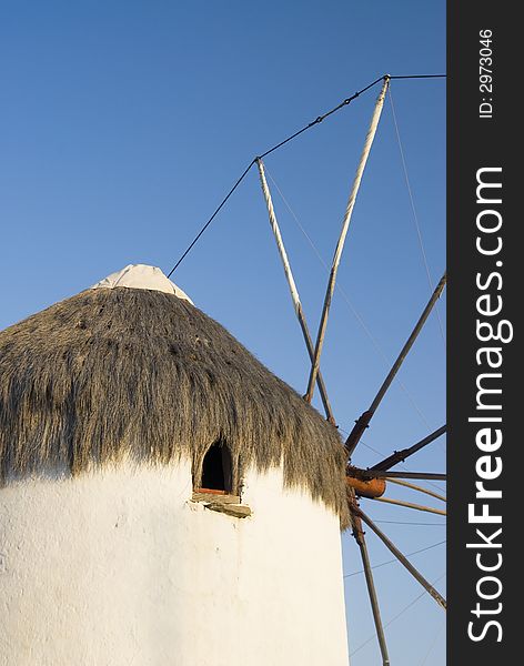Traditional windmill with thatched roof greek islands. Traditional windmill with thatched roof greek islands