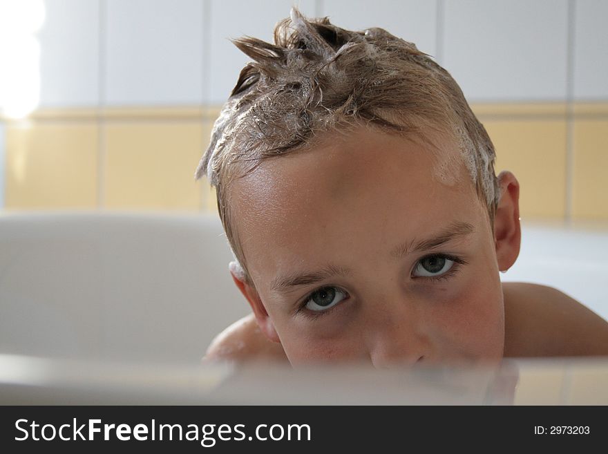 Photo of young happy boy in bath. Photo of young happy boy in bath