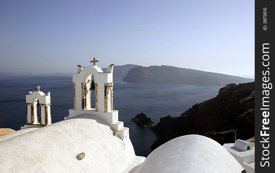 This Church overlooks the Caldera from Oia  appearing to guard the Caldera from another eruption. This Church overlooks the Caldera from Oia  appearing to guard the Caldera from another eruption.