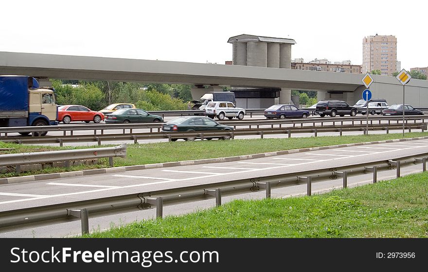 Cars move on highway at high speed