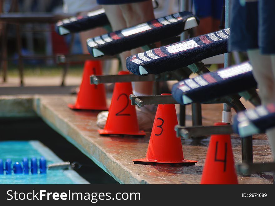 Row of blocks at a swim meet. Row of blocks at a swim meet.