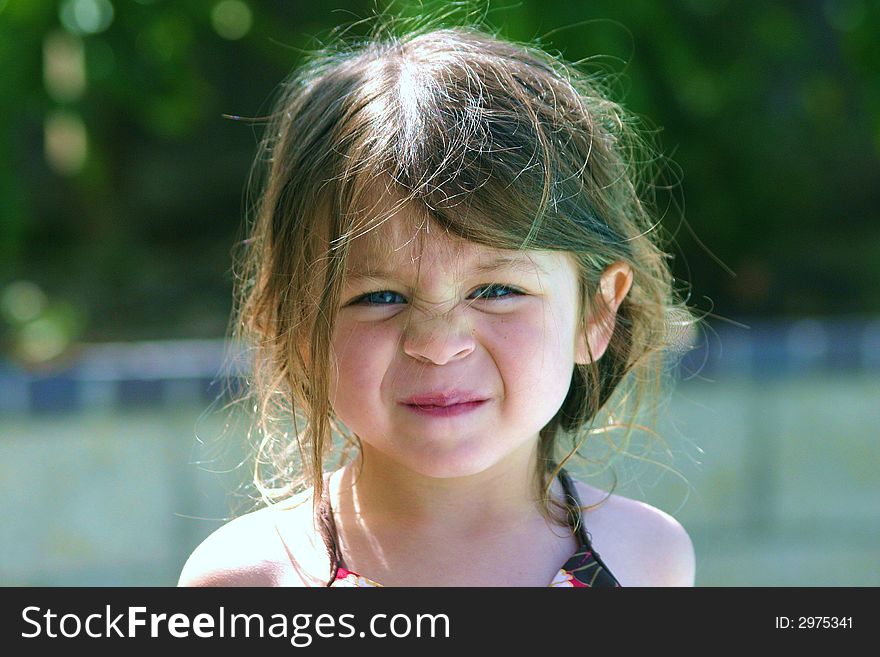 Young girl after a day in the pool. Young girl after a day in the pool.