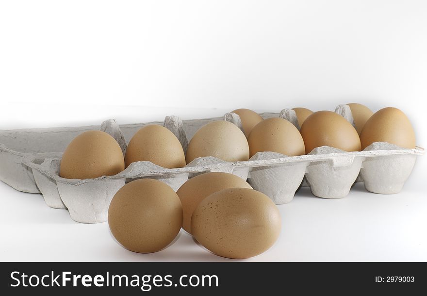 Open carton of farm fresh brown chicken eggs. Open carton of farm fresh brown chicken eggs
