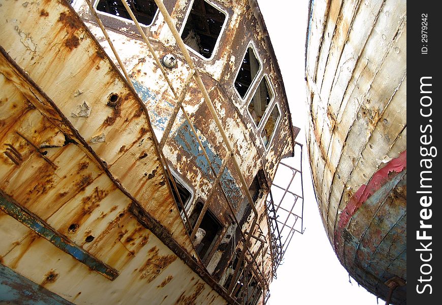 Two old rusty fishing boats. Two old rusty fishing boats