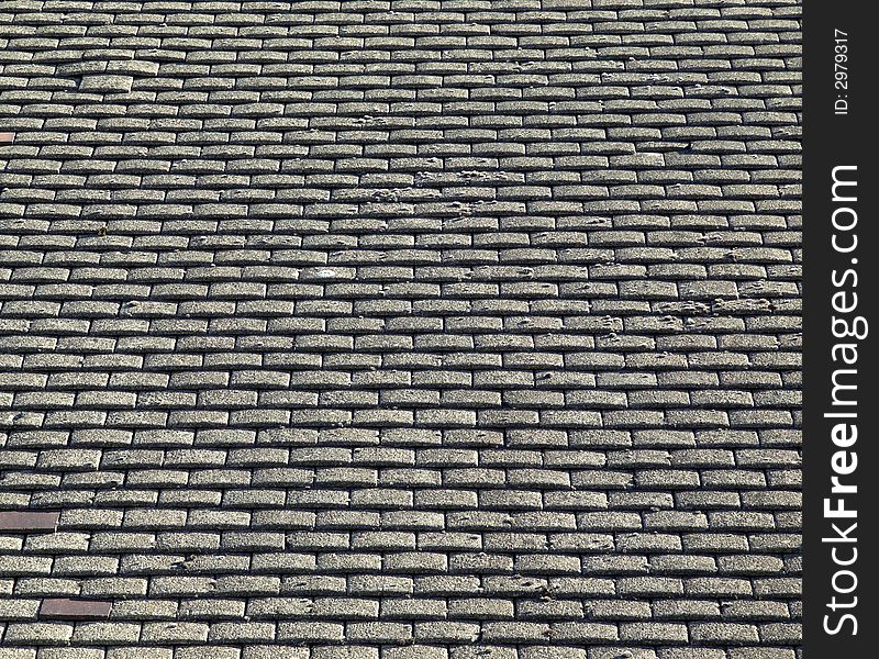 A photo of a roof top tile pattern background. A photo of a roof top tile pattern background.