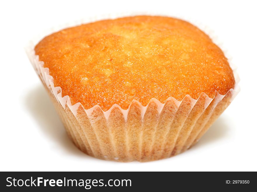 Closeup of tasty muffin isolated on white background.