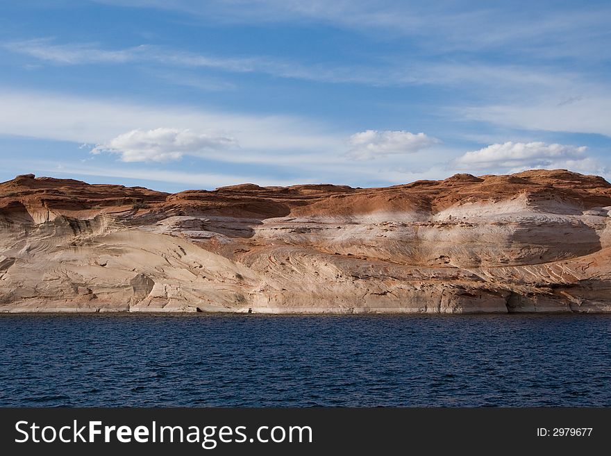 The shores of Lake Powell in late afternoon. The shores of Lake Powell in late afternoon