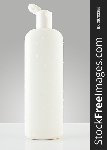 grayscale white plastic bottle of gel, liquid soap, lotion, cream, shampoo