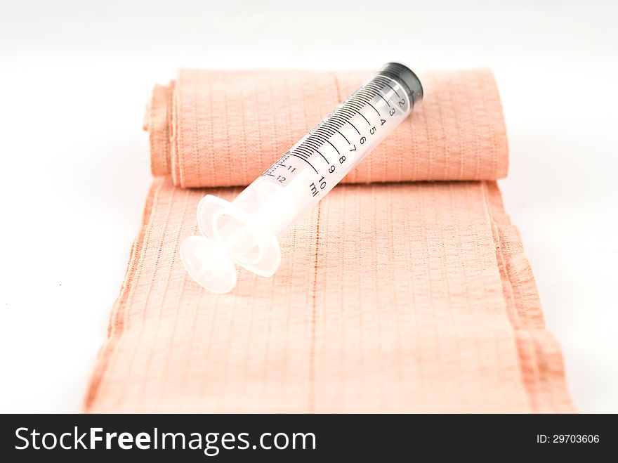 Elastic Bandage  And Plastic Syringe