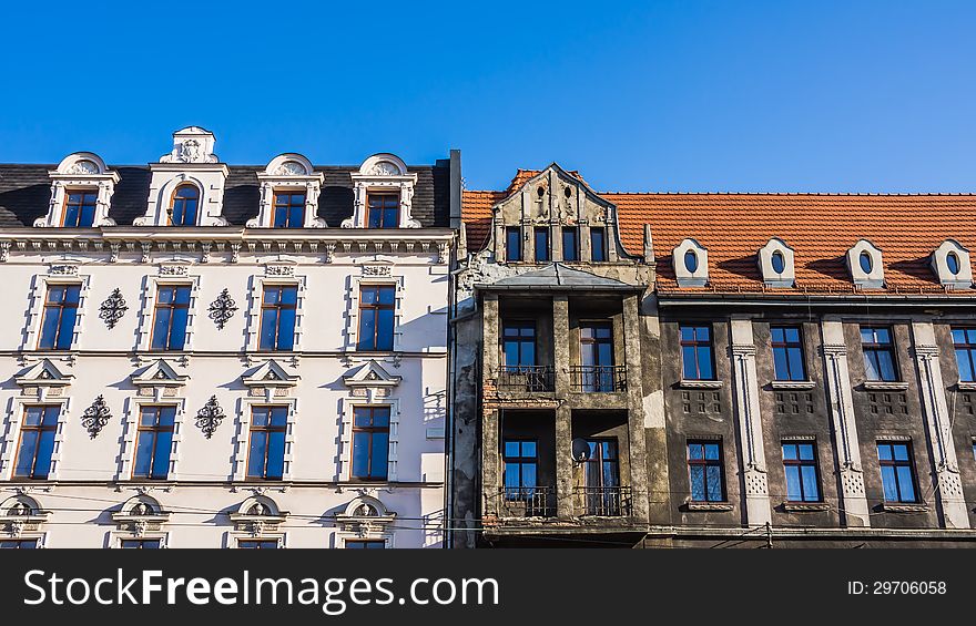 Destroyed and renovated facades of old tenements in Katowice, Silesia, Poland.