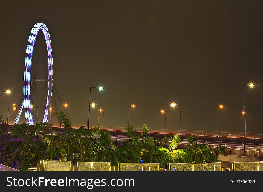 Singapore flyer views near the shoppes at marina bay sands. Singapore flyer views near the shoppes at marina bay sands