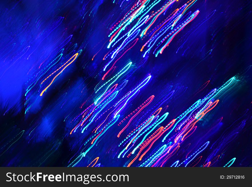 Abstract lines of lights on dark blue background