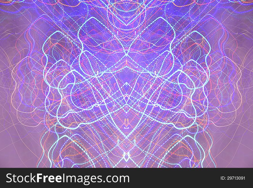 Photo of light trails in motion. Abstract symmetry. Photo of light trails in motion. Abstract symmetry.