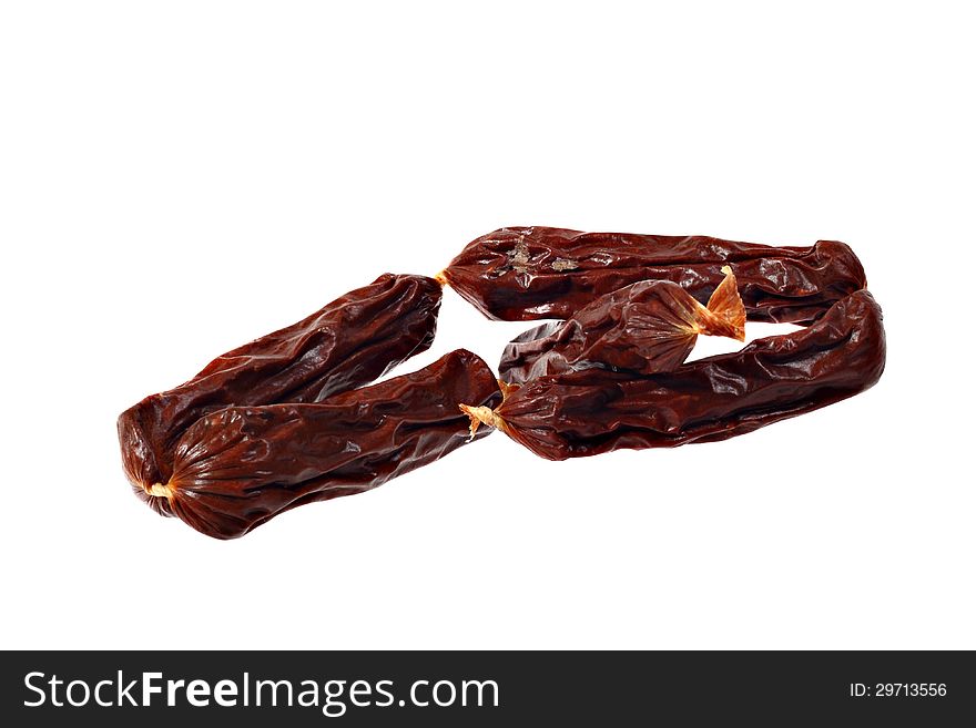 Dried sausages for dogs  on white background. Dried sausages for dogs  on white background