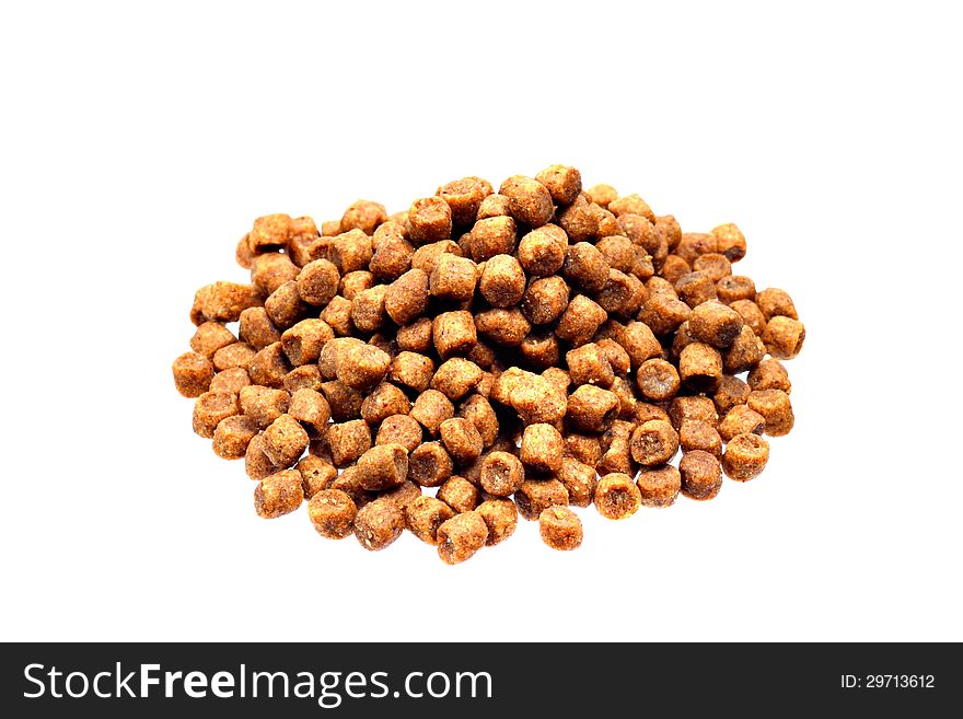 Dried pet food in pile on white background
