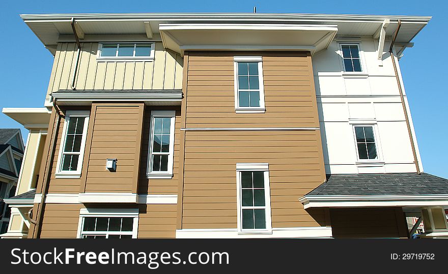 Exterior view of a new modern home. Exterior view of a new modern home.