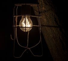 Old Dirty Glowing Bulb. On Black Background. Royalty Free Stock Photo Old Dirty Glowing Bulb. On Black Background. Royalty Free Stock Photo