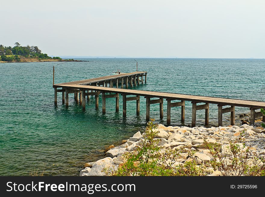 Wooden Bridge walk way to sea. Wooden Bridge walk way to sea.