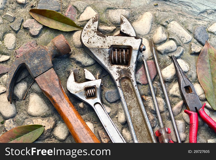 Some tools in the rough ground.