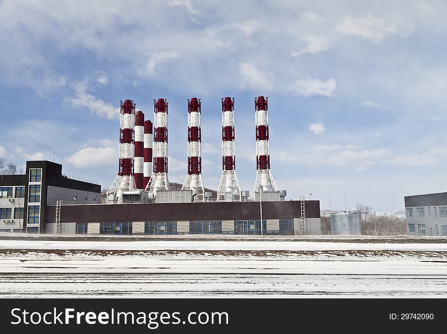 Power plant pipes against the blue sky