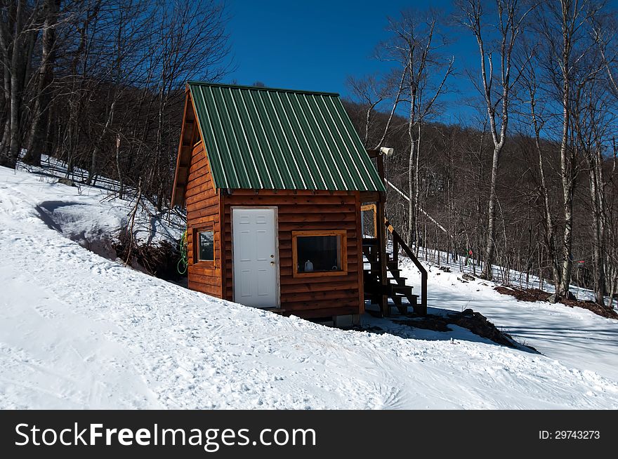 Mini log cabin in mountain forest with snow. Mini log cabin in mountain forest with snow