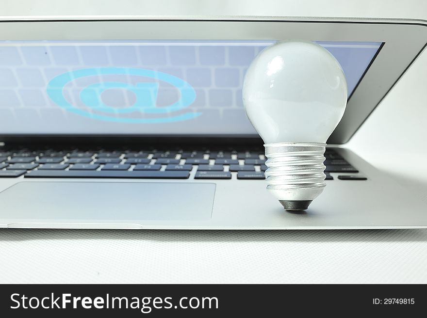 Keyboard with Ideas button and light bulb.@. Keyboard with Ideas button and light bulb.@