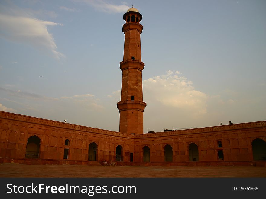 A good view of Kings Mosque one tower (in Urdu called Bashai Masjid) build by Jhanger Emperor in 16th century. Located in Lahore, Pakistan. A good view of Kings Mosque one tower (in Urdu called Bashai Masjid) build by Jhanger Emperor in 16th century. Located in Lahore, Pakistan.