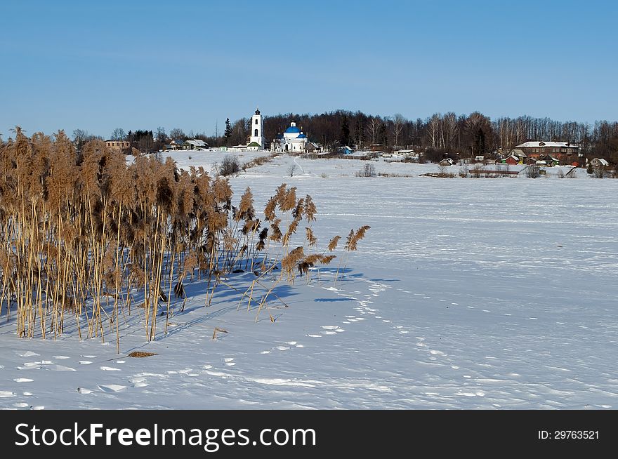 Winter Rural Landscape With Frozen River