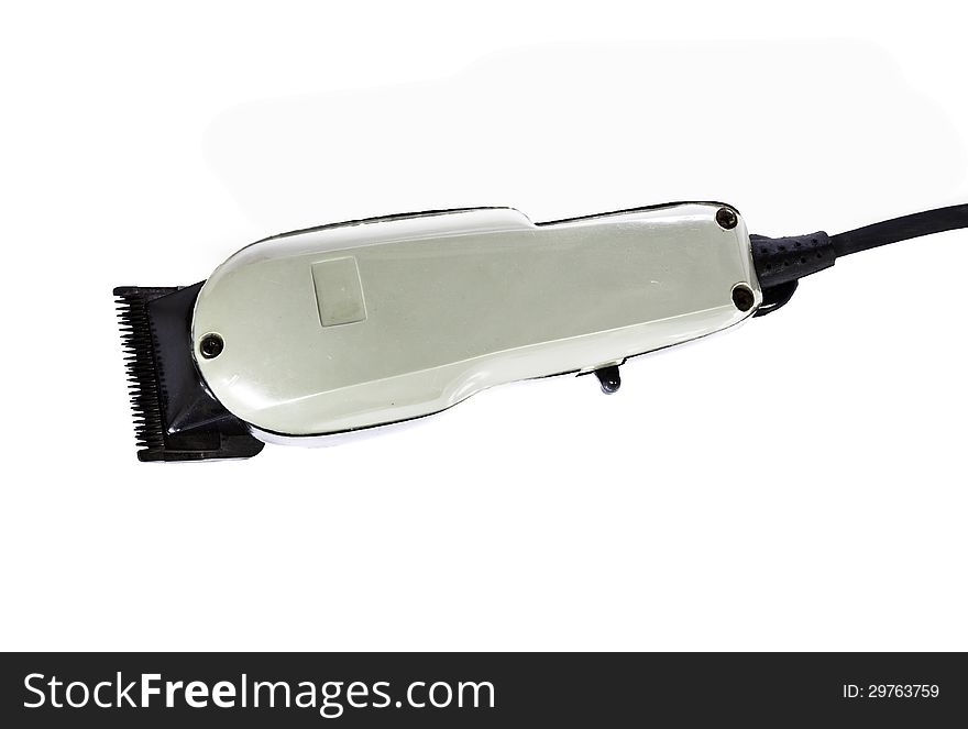 The old hair clipper on white background