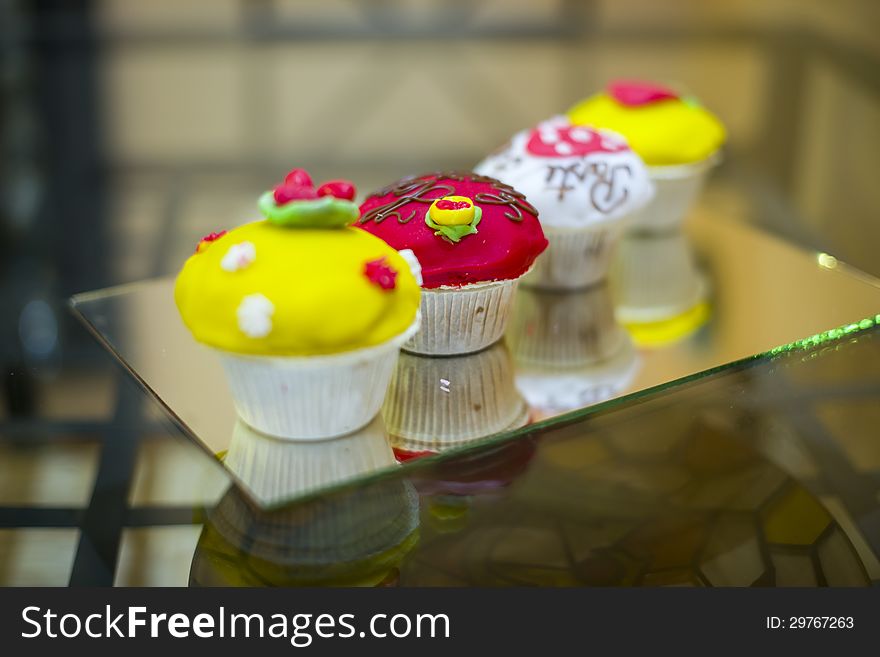 Deliciously looking and colorful muffins shot in shallow depth of field. Deliciously looking and colorful muffins shot in shallow depth of field