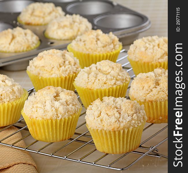Lemon muffins in muffin cups on a rake