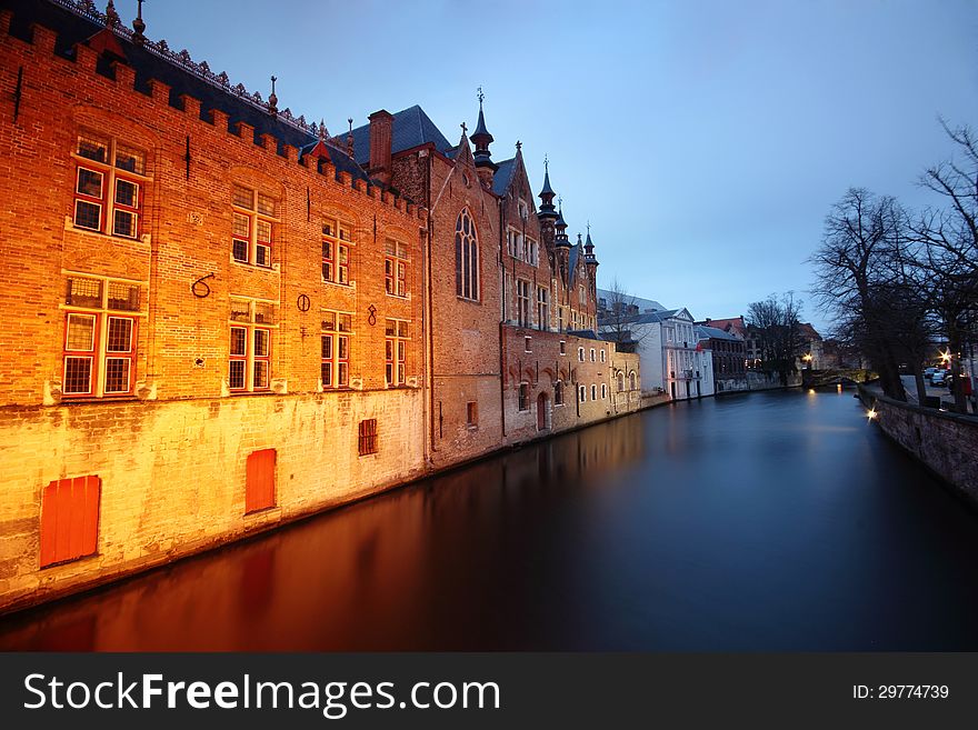 Traditional Houses Reflected In The Water Canals From Bruges &x28;Brugge&x29; - Belgium.