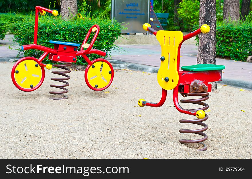 Toy spring rocking in playground