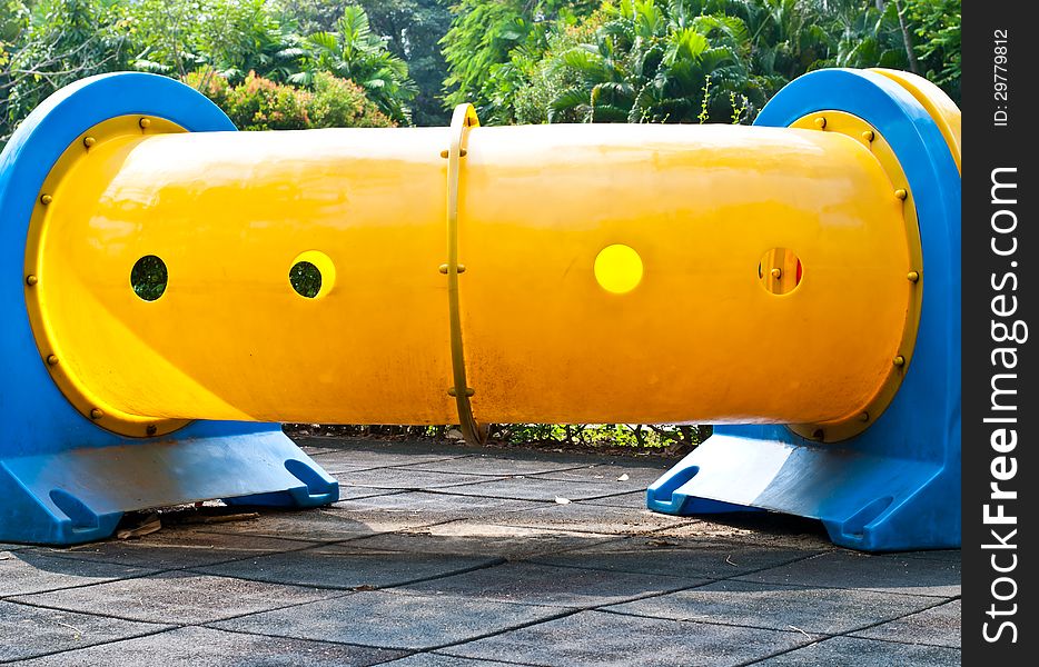 Colorful tube in playground of garden