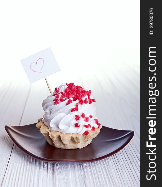 Cake with a sign for text on white background