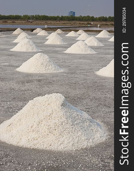 Many salt piles in the  salt field of Samutsongkram, Thailand