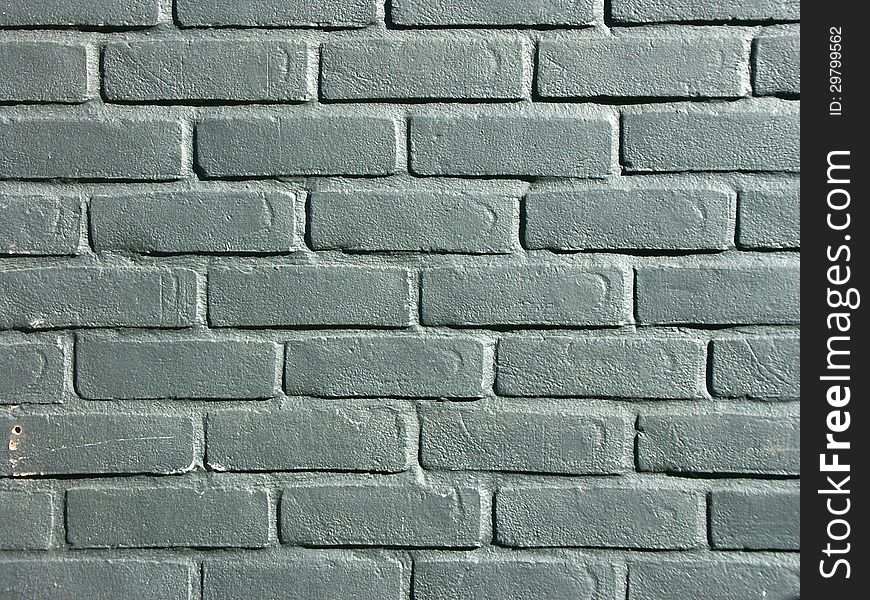 Close up of section of grey painted brick wall. Close up of section of grey painted brick wall